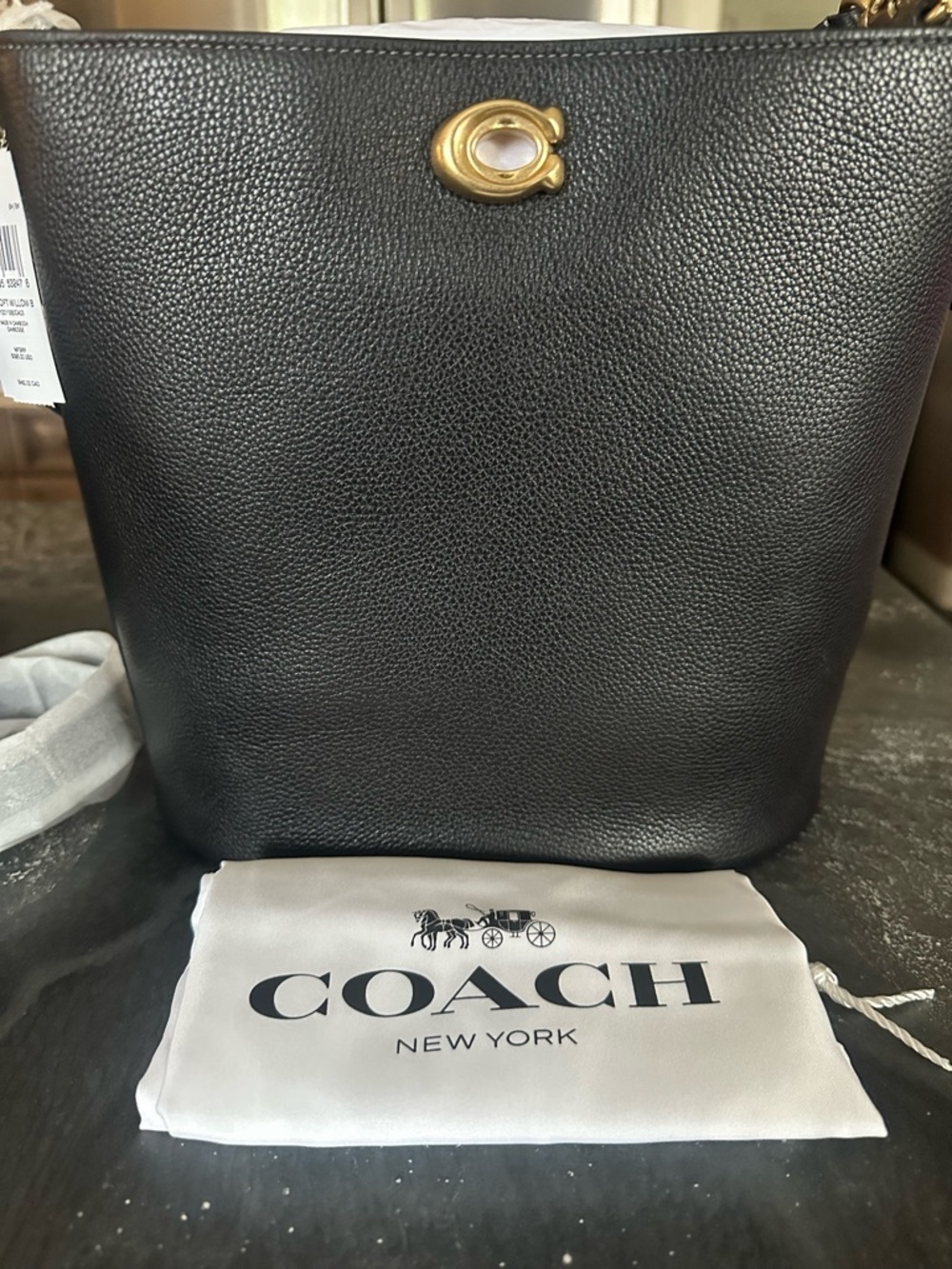 Coach Black Pebbled Leather Bucket Bag with Gold Hardware Accent